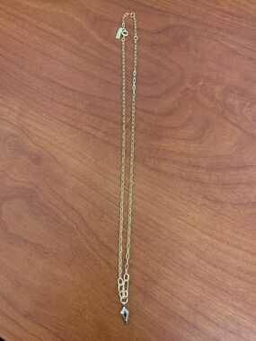 Ania Haie gold tone necklace with blue kite shaped stone. Delicate and beautiful